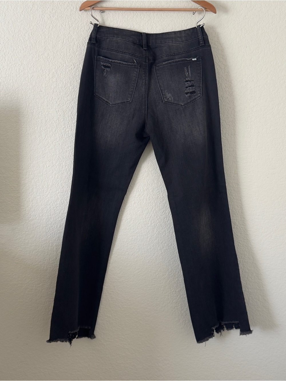 High-Rise Washed Black Ankle Jeans with Distressed Hem